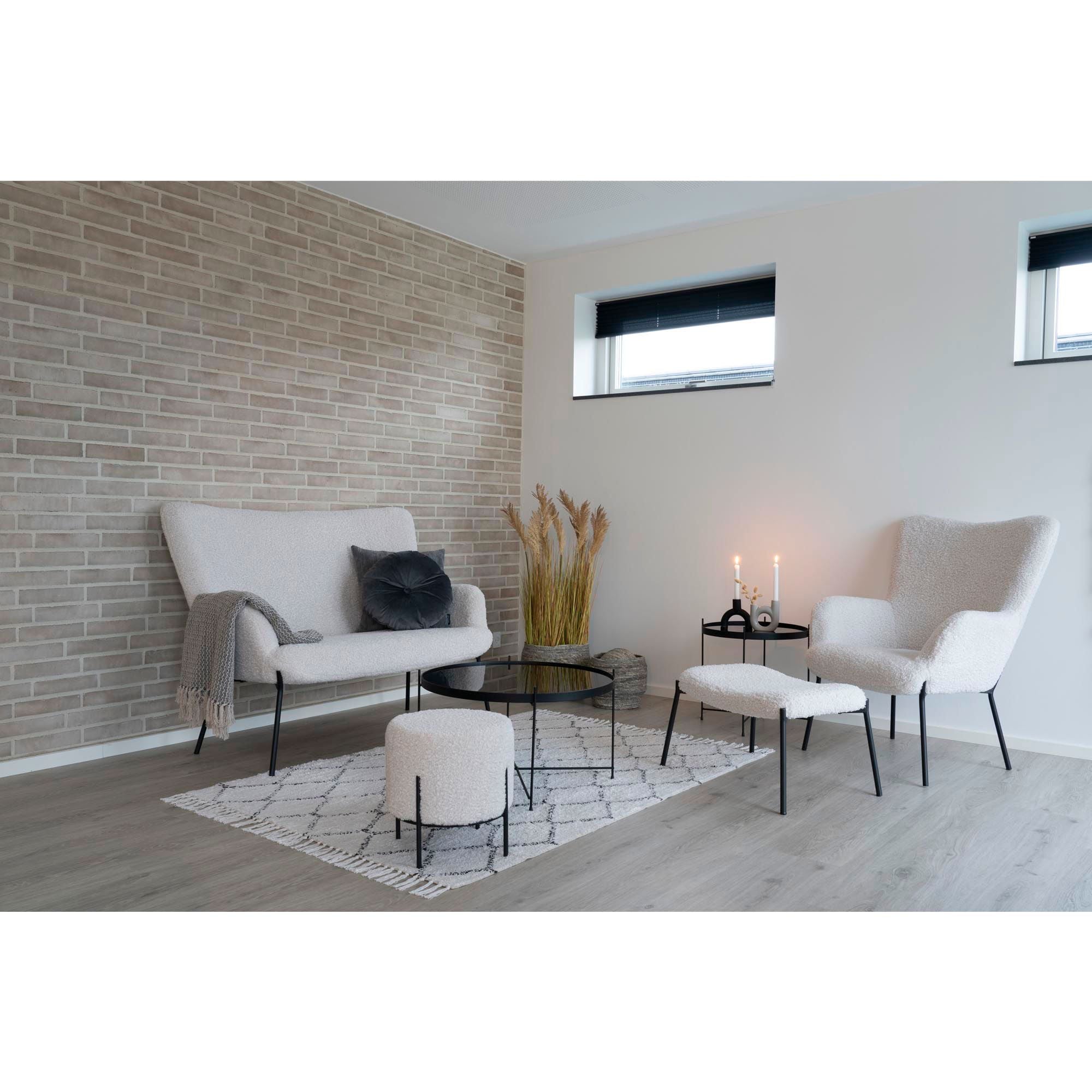 Glasgow Fußhocker aus Kunstlammfell, Weiß mit schwarzen Beinen